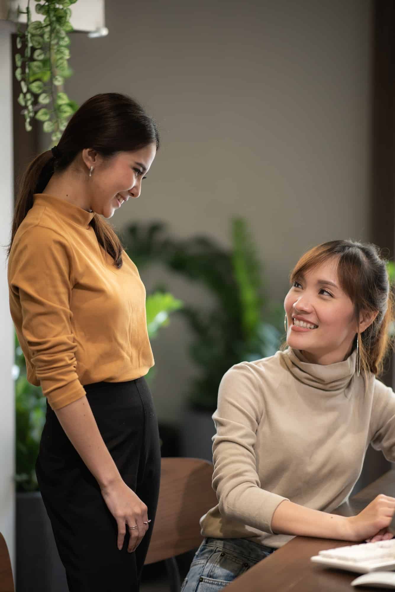 Female business financial advisor consulting a client